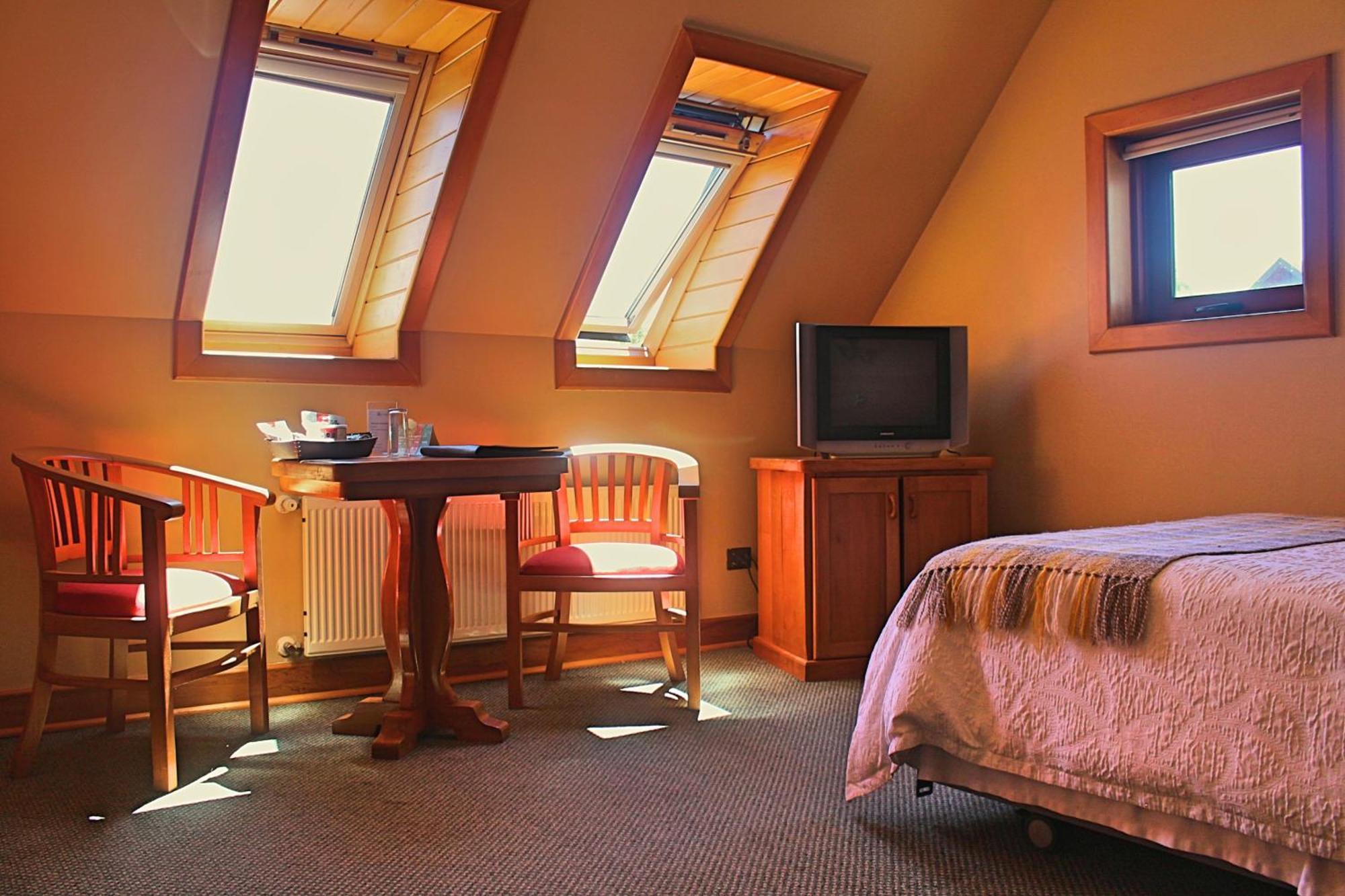 Hotel Puelche Puerto Varas Ruang foto