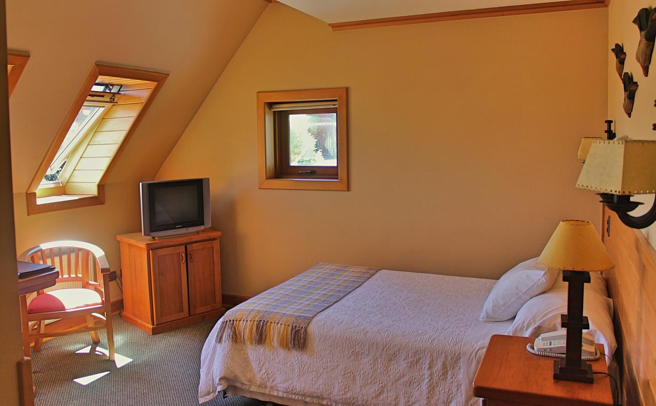Hotel Puelche Puerto Varas Ruang foto